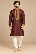 Maroon Raw Silk Gold Embroidered Kurta – front view on a model, with gold floral embroidery on the collar, placket and cuffs