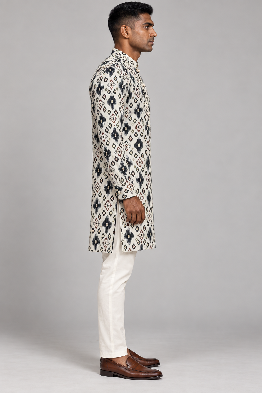 Ivory Semi-Cotton Ikat Print Kurta – side view showing the straight knee-length cut