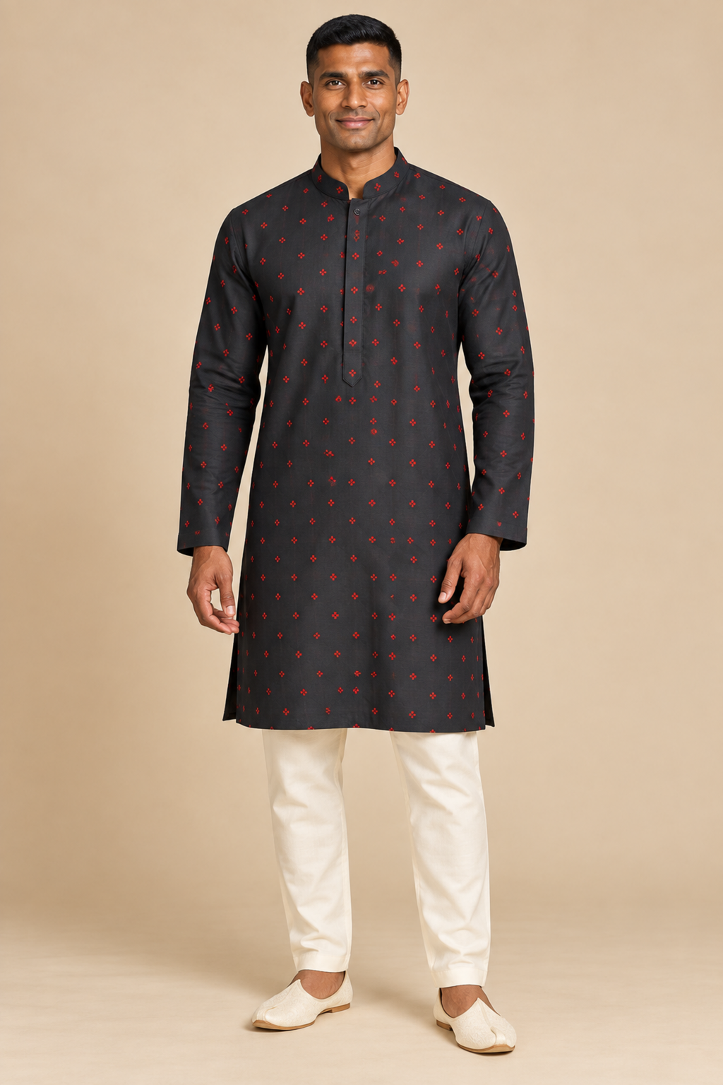 Charcoal Black Semi-Cotton Kurta with Red Motifs – front view on a model, with small red geometric motifs scattered across the charcoal fabric