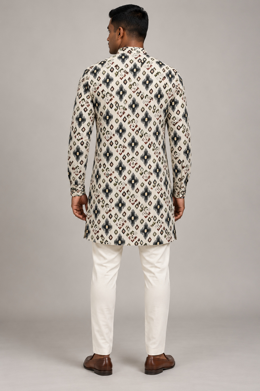 Ivory Semi-Cotton Ikat Print Kurta – back view showing the continuous ikat print