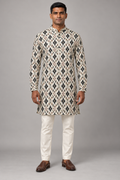 Ivory Semi-Cotton Ikat Print Kurta – front view on a model, with all-over black, grey and rust ikat diamond print