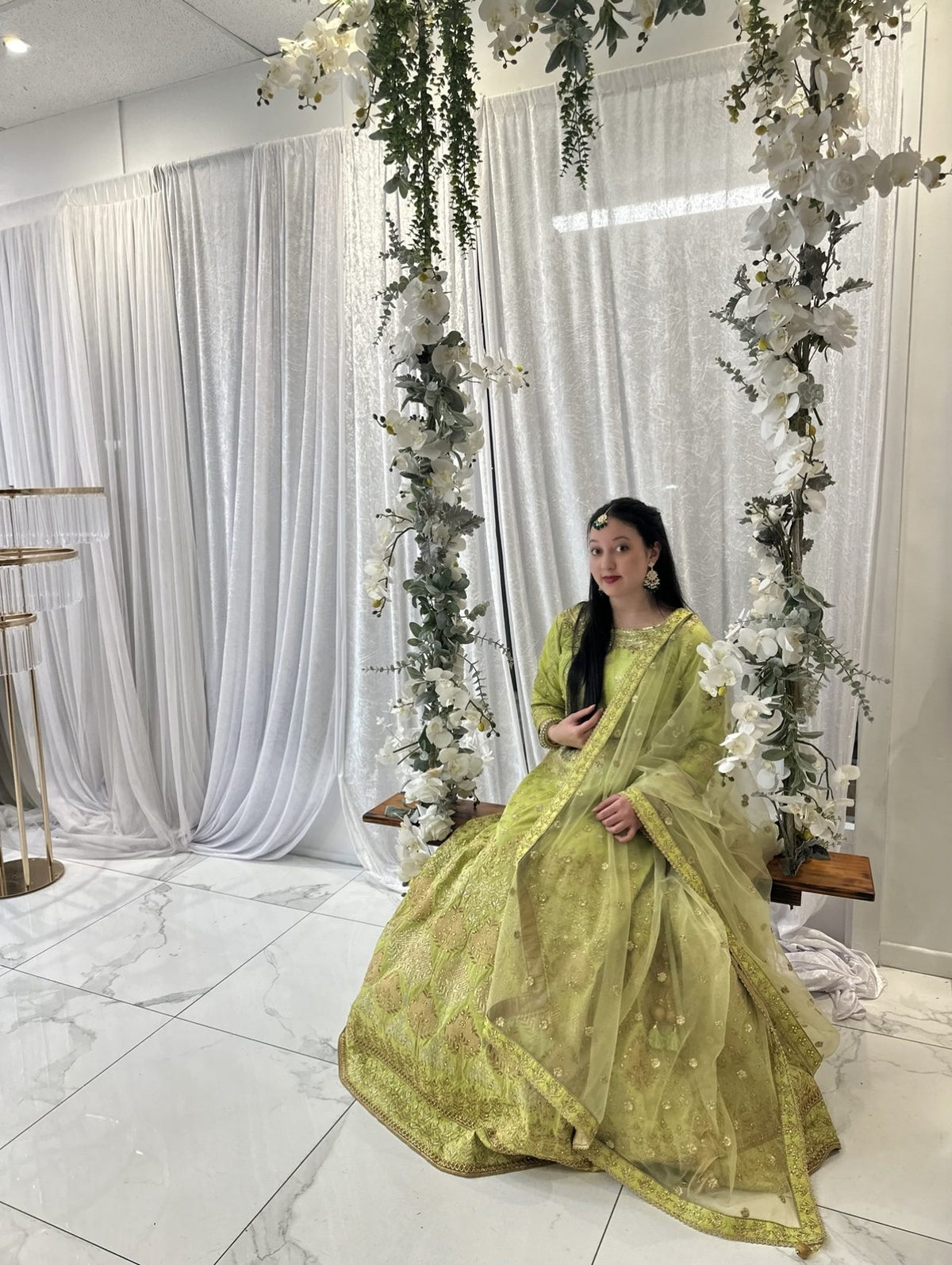Customer in a green lehenga