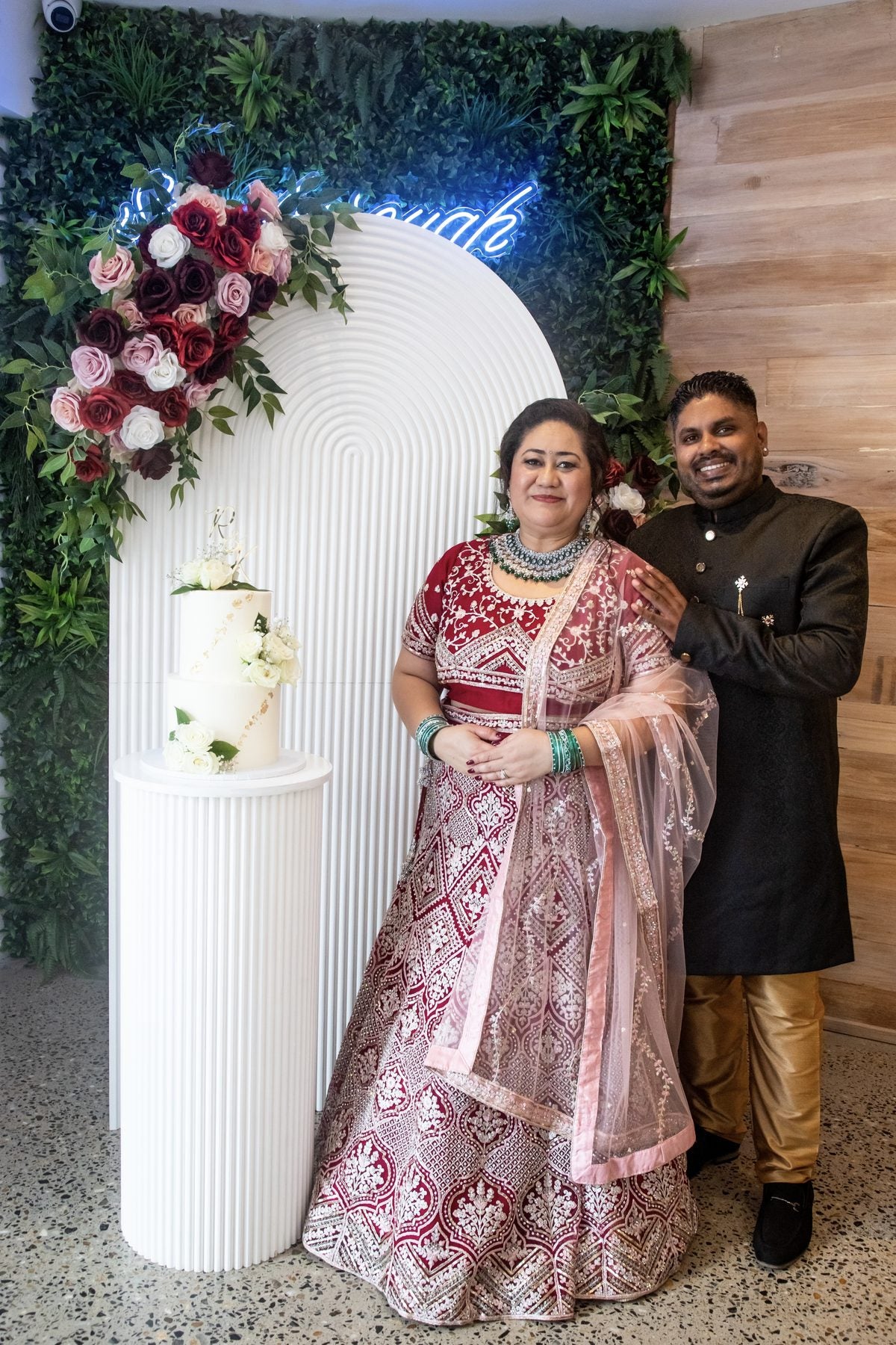 Couple in a pink lehenga and sherwani