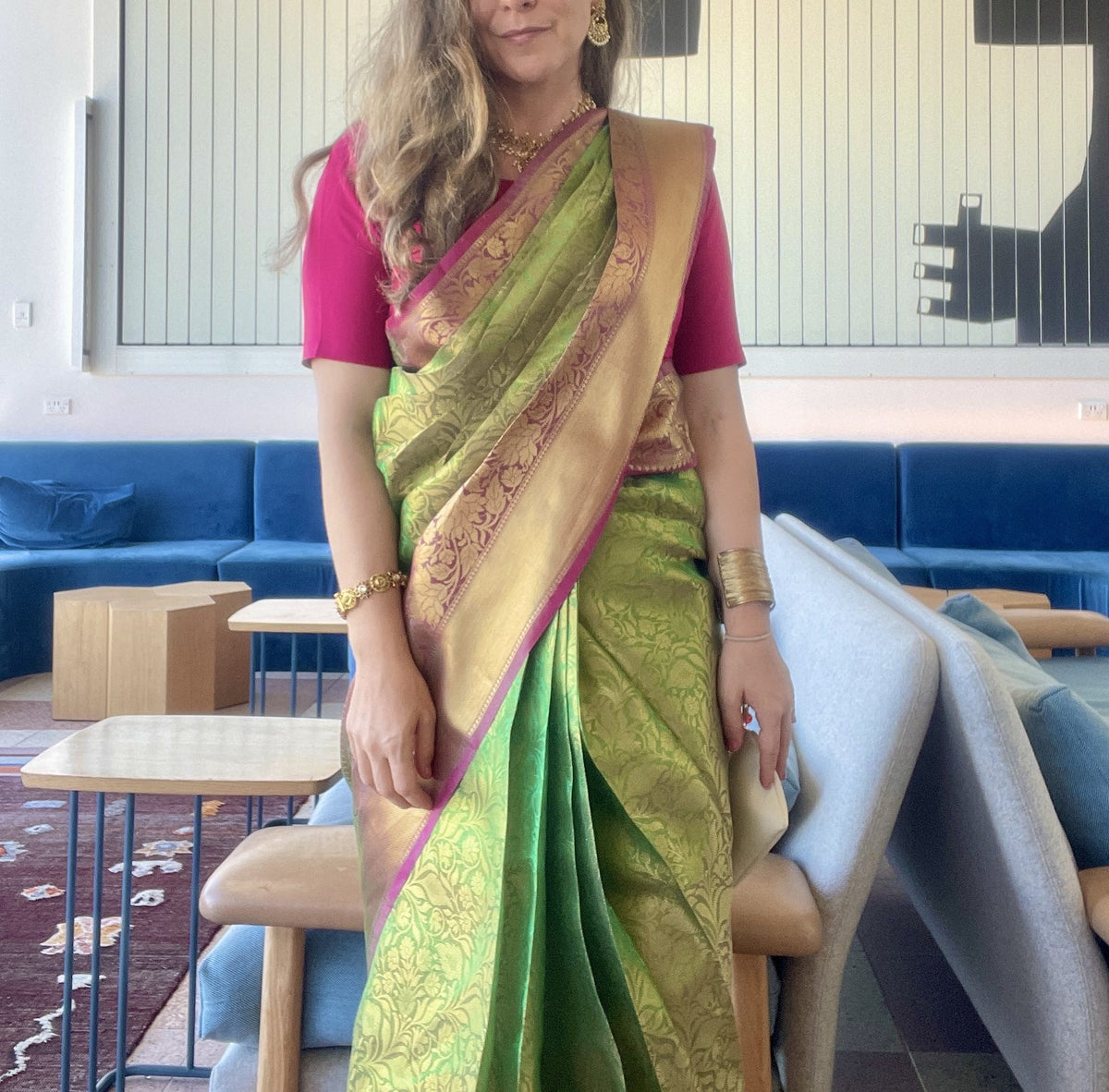 Customer in a green silk saree