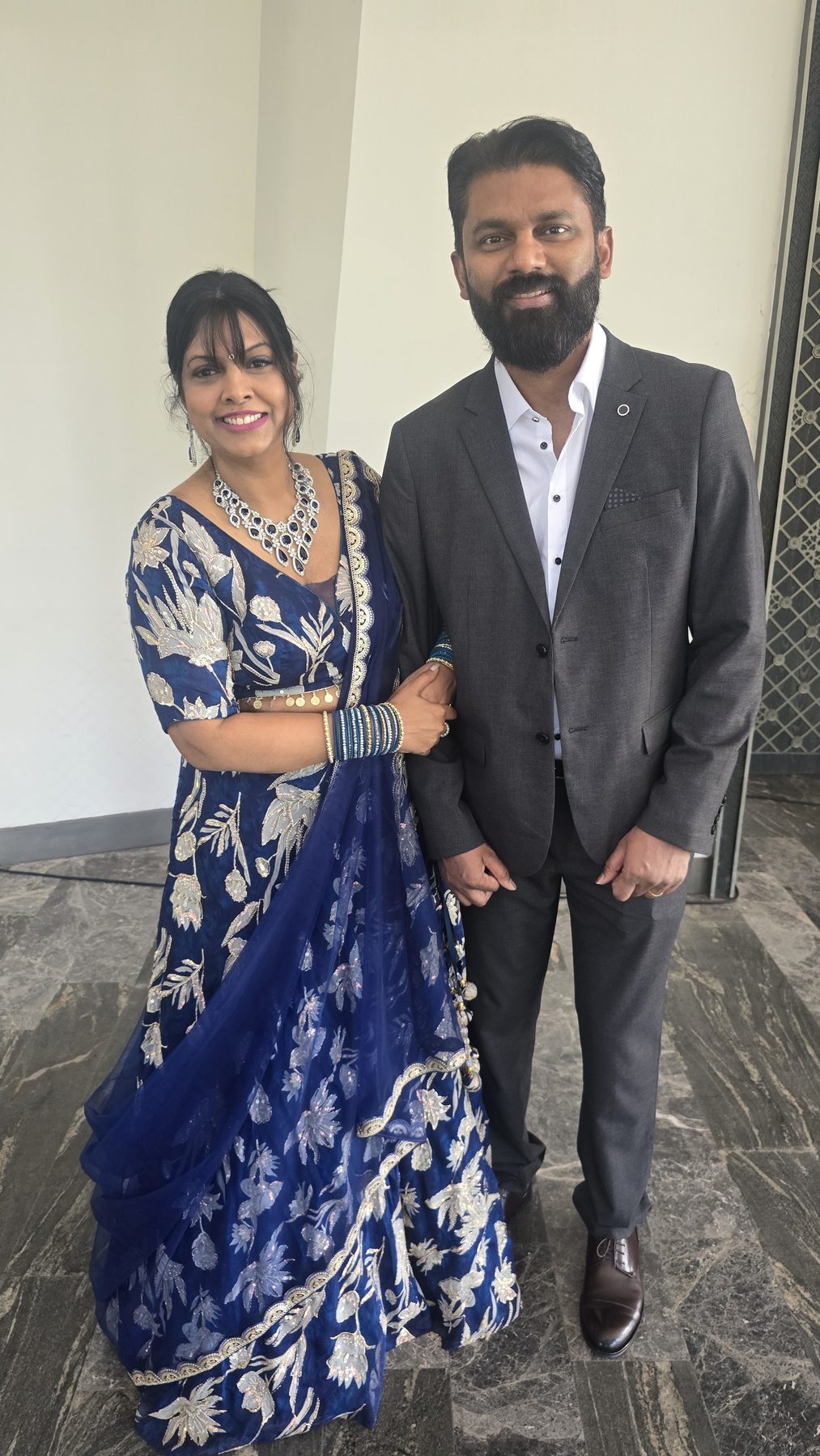Couple in a blue lehenga and suit